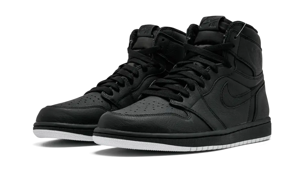 Jordan 1 Retro Black Perforated - Image 1