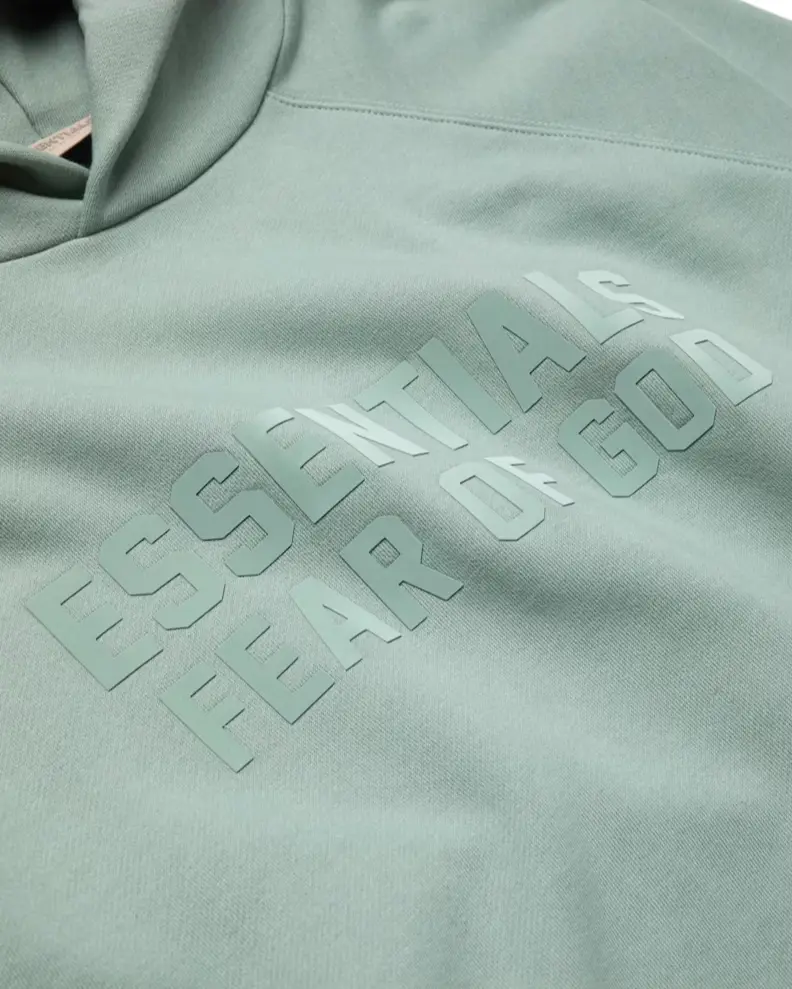 Fear of God Essentials Hoodie Sycamore - Image 1